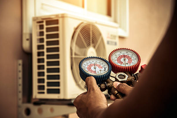 Professional Air Conditioning Service technician working in Port Ewen, NY